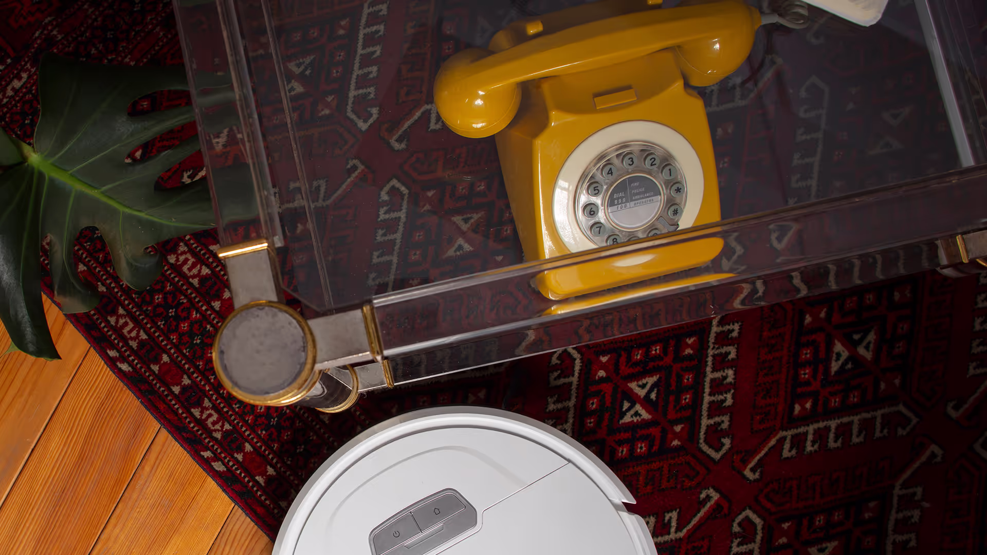Robot vacuum on wooden floor